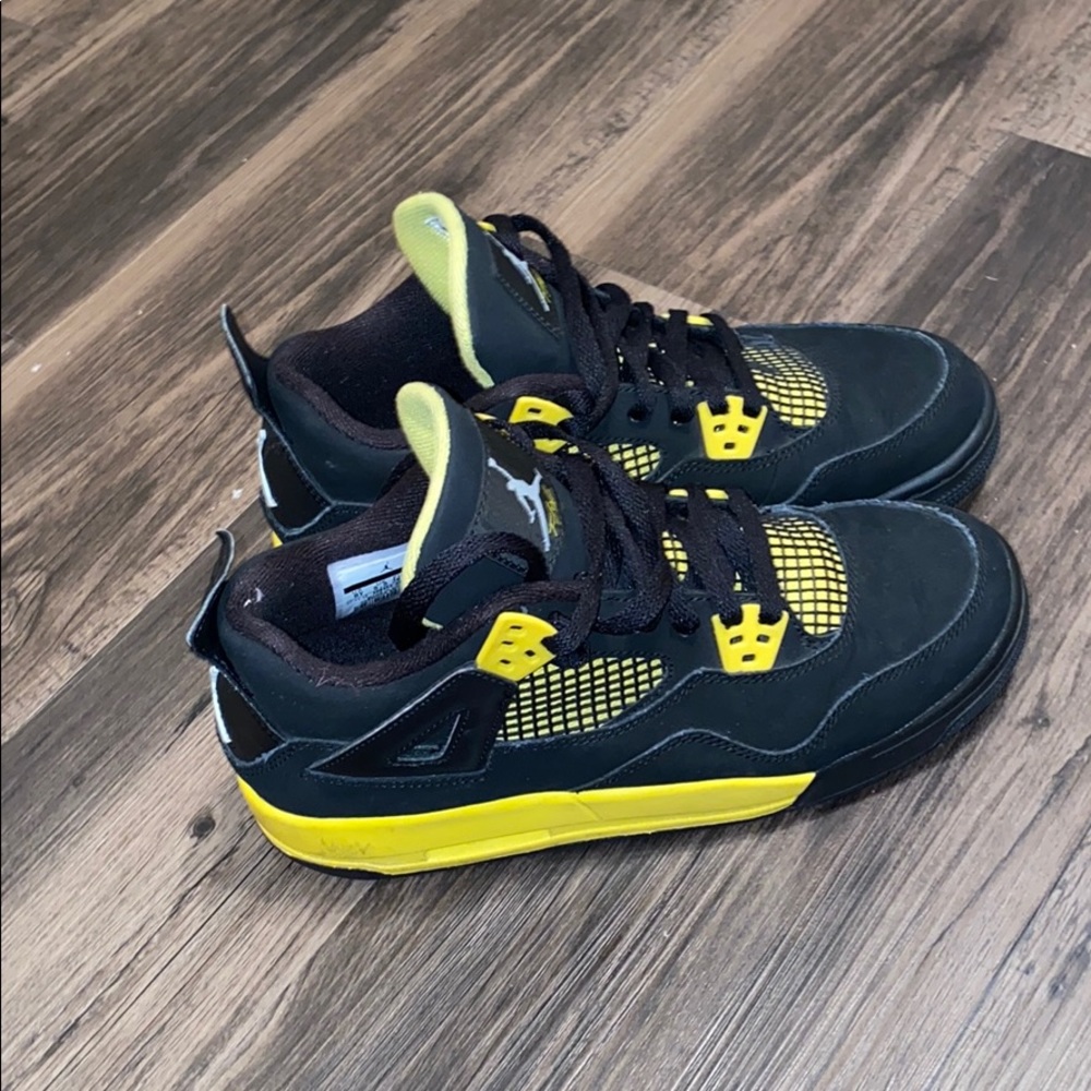 Black and Yellow Air Jordan 4